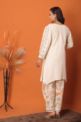 "Ivory Elegance – Embroidered Kurta Set with Lace Detailing"