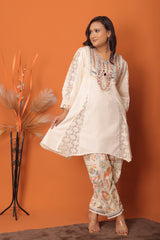 "Ivory Elegance – Embroidered Kurta Set with Lace Detailing"
