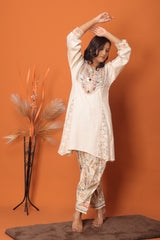 "Ivory Elegance – Embroidered Kurta Set with Lace Detailing"